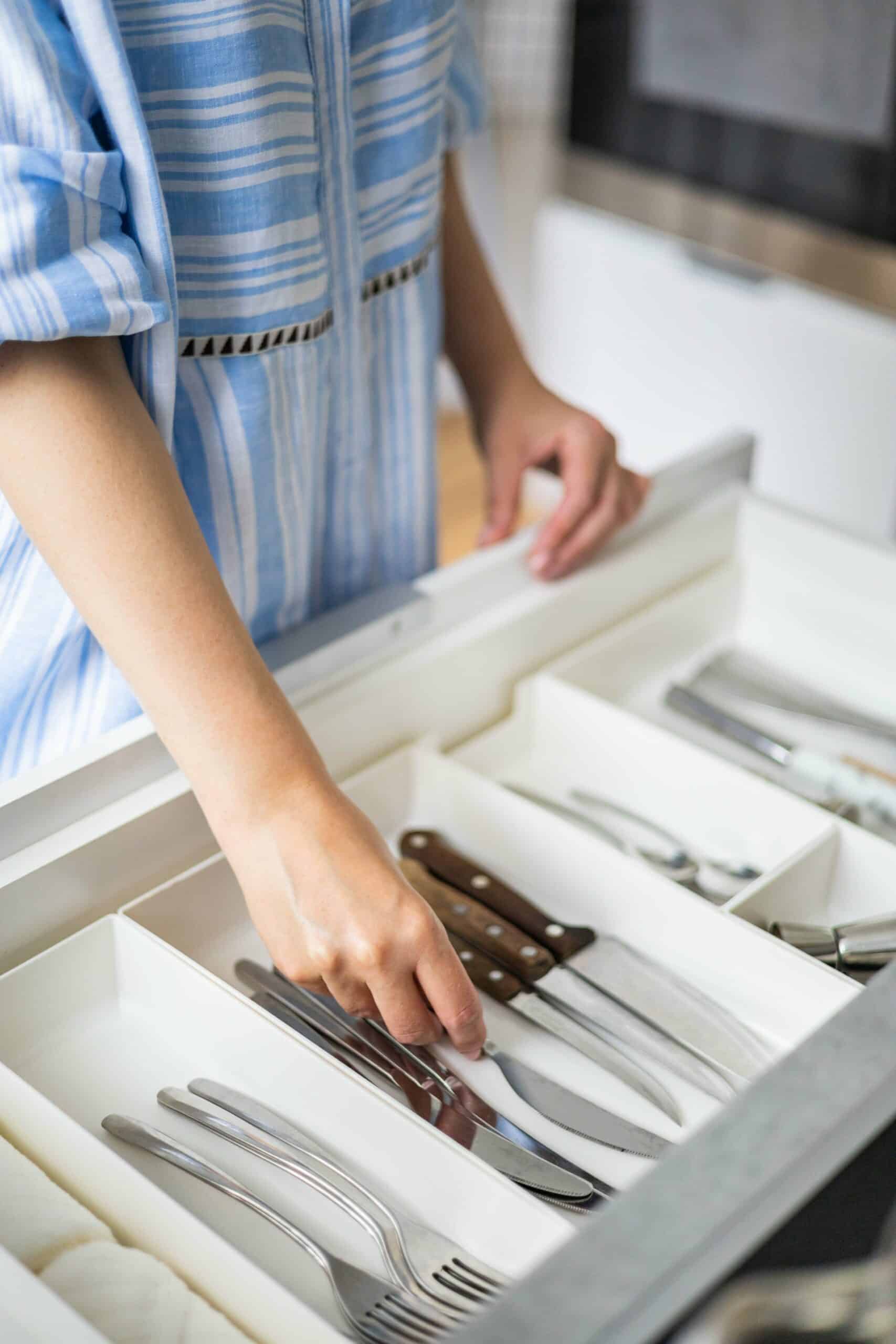 Professional organiser decluttering kitchen