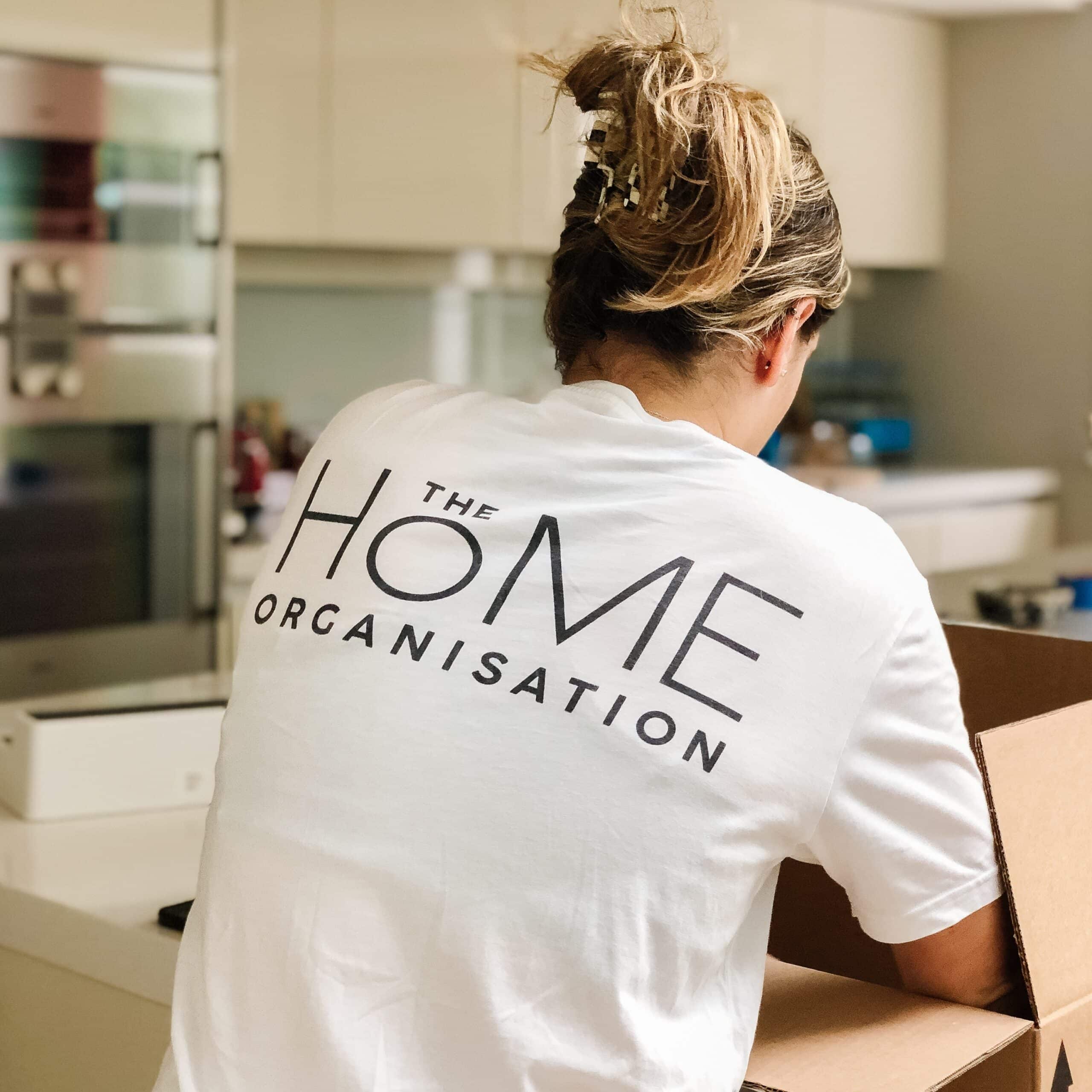 Home Organiser unpacking a kitchen in London